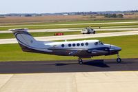 N24HD @ CID - Taxiing to Runway 27 for departure - by Glenn E. Chatfield