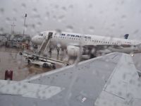 F-GRHN @ LFPG - Rainy day at Roissy CDG - by Erdinç Toklu