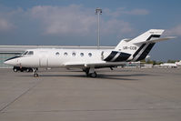 UR-CCB @ VIE - Falcon 20
