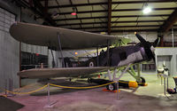 N2235R @ KMAF - Swordfish tucked into the back of the hangar during CAF Airsho 09. - by TorchBCT