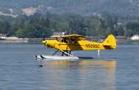 N929SC - Float-equipped 1978 Piper PA-18-150 taxiing through the birds on Clear Lake near Lakeport, CA - by Steve Nation