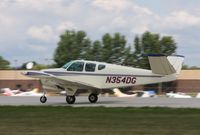 N354DG @ KOSH - Beech J35