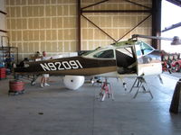 N92091 @ 2Q3 - 1969 Cessna 182M being disassembled for shipment overseas - by Steve Nation