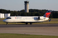 N868CA @ ORF - Delta Connection (Comair) N868CA (FLT COM561) taxiing to RWY 23 for departure to John F Kennedy Int'l (KJFK). - by Dean Heald