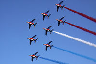 E135 - Patrouille de France, the French Air Force aerobatic team, performing a flyover of the Yorktown Victory Monument in Yorktown, VA to signify the age-old alliance between the United States and France that traces its roots to the Revolutionary War.