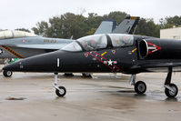 N55107 @ NTU - 1984 Aero Vodochody L-39C Albatros N55107 leaving the static display area heading to the Hot Box area in preparation for a flight. This day was a washout due to low ceilings and persistent drizzle.