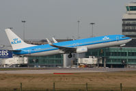 PH-BXT @ EGCC - Climbing away from Runway 05L. - by MikeP