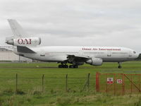 N522AX @ EINN - OMNI Air bringin American troops home - by Robert Kearney