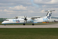 G-JECU @ EGCC - Lining up on 23L. - by MikeP