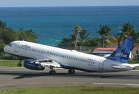 N605JB @ TNCM - Doing a long flair. roll out.