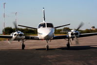 D-IAAZ @ EGGP - Cessna 404 Titan Courier 2 - by Chris Hall