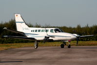 D-IAAZ @ EGGP - Cessna 404 Titan Courier 2 - by Chris Hall