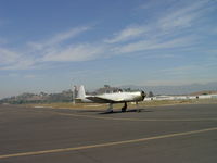 N186JD @ POC - Taxiing to taxiway to head west to transient parking area - by Helicopterfriend