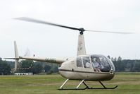 OO-NRG @ EBDT - Heavy cross wind correction during landing.rivate helicopter at the old timer fly in.