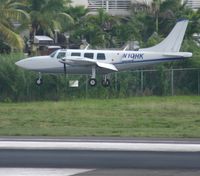 N10HK @ TNCM - This aircraft landed at tncm but just have a look at the cargo door. and ask your self what???? - by Daniel Jef