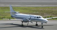 N242DH @ TNCM - Taxing to parkingat the cargo ramp
