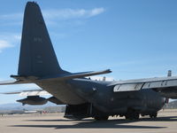 64-0565 @ KTUS - USAF C-130 getting service