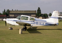 G-BIWW @ EGTC - American Aviation AA-5. Previously registered as OY-AYV. Parked alongside Cranfields pub, the Dakota Inn in 1988. - by Malcolm Clarke