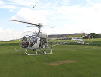 G-BFEF @ EGCJ - Agusta Bell 47G-3B-1. Just touching down as G-JWEB passes overhead. At Sherburn's May Fly-in in 2004. - by Malcolm Clarke