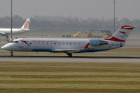 OE-LCQ @ VIE - Austrian arrows Canadair Regional Jet CRJ200LR