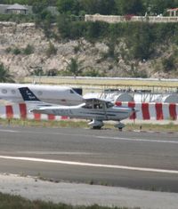 N21524 @ TNCM - taxing in from the active runway