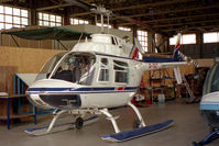 G-TILT @ EGTC - Bell 206B. At Cranfield Airfield, Beds, UK. - by Malcolm Clarke