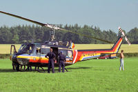 G-HUEY @ EGTC - Bell UH-1H. Previously AE-413. At Cranfield Airfield, Beds, UK. - by Malcolm Clarke