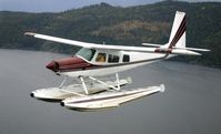 N6463V - Helio Super Courier w/PK-3500 floats - by Stephen Ruby