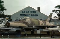 54-1986 @ VPS - F-100C Super Sabre bearing the signature of Medal of Honour recipient Col Bud Day displayed in November 1979 at the USAF Armament Museum . - by Peter Nicholson