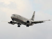 SX-BLM @ EGGP - Aegean Airlines - by Chris Hall