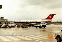 HB-IVH @ LSGG - Fokker 100 of Swissair seen at Geneva in March 1994. - by Peter Nicholson