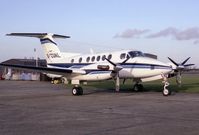 G-CUKL @ EGTC - Beech 200 at Cranfield Airfield, UK in 1988. Later registered in France as F-GGLH. - by Malcolm Clarke