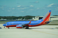 N742SW @ KRSW - Boeing 737-700 - by Mark Pasqualino