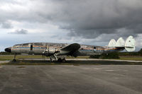 HI-542CT @ TJBQ - TJBQ Hit by a DC-4 on 3rd Feb 1992 DBR subsequently W/O - by Nick Dean