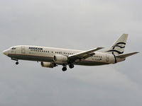 SX-BLM @ EGGP - Aegean Airlines - by Chris Hall