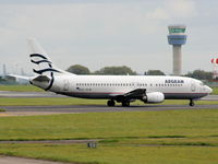 SX-BLM @ EGGP - Aegean Airlines - by Chris Hall