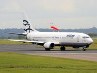 SX-BLM @ EGGP - Aegean Airlines - by Chris Hall