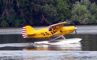 N2505P @ OSH - I caught him surfing at the Oshkosh Water Base - by Nathan Margo