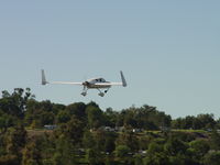 N433DP @ POC - Westbound from 26R, front wheel retracting - by Helicopterfriend