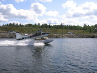 C-GUFH - On the slide with a canoe - by Kelsey