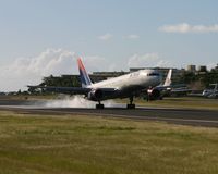 N678DL @ TNCM - landing at tncm