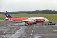 G-SUEW @ EGNT - Airbus A320-214 at Newcastle Airport, UK. - by Malcolm Clarke