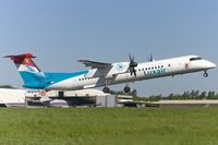LX-LGC @ ELLX - departing Luxemburg via RW06 - by FBE