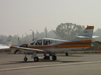 N114GG @ POC - Cowling off for engine work at Howard Aviation - by Helicopterfriend