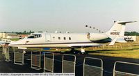 N1055C @ EGLF - Learjet 55C at 1988 Farnborough Air Show - by moxy