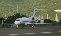 N251VP @ TNCM - A close up of N251VP back tracking runway 28