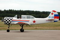 SE-LXM @ ESSF - Mattias Nyberg taxying his Yak-52 for a flight display at Hultsfred airfield, Sweden - by Henk van Capelle