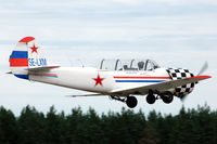 SE-LXM @ ESSF - Low fly-past of Mattias Nyberg in his Yak-52, Hultsfred airfield, Sweden - by Henk van Capelle