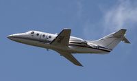 VH-BZL @ BNE - Beech 400A BZL after takeoff at Brisbane - by rkc62