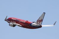 VH-VBB @ BNE - Barossa Babe showing dorsal fairing
